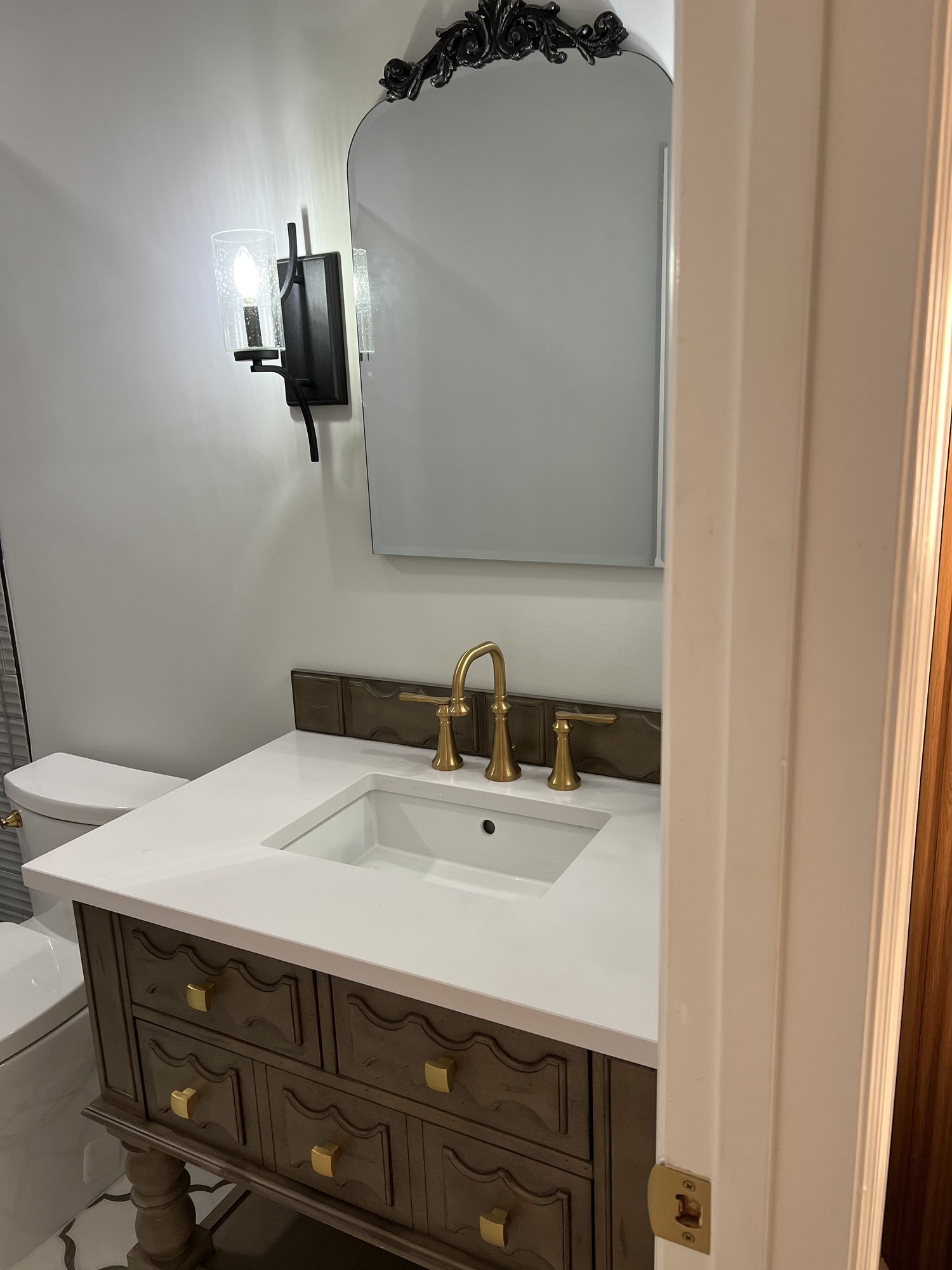 Bath vanity with brass faucet