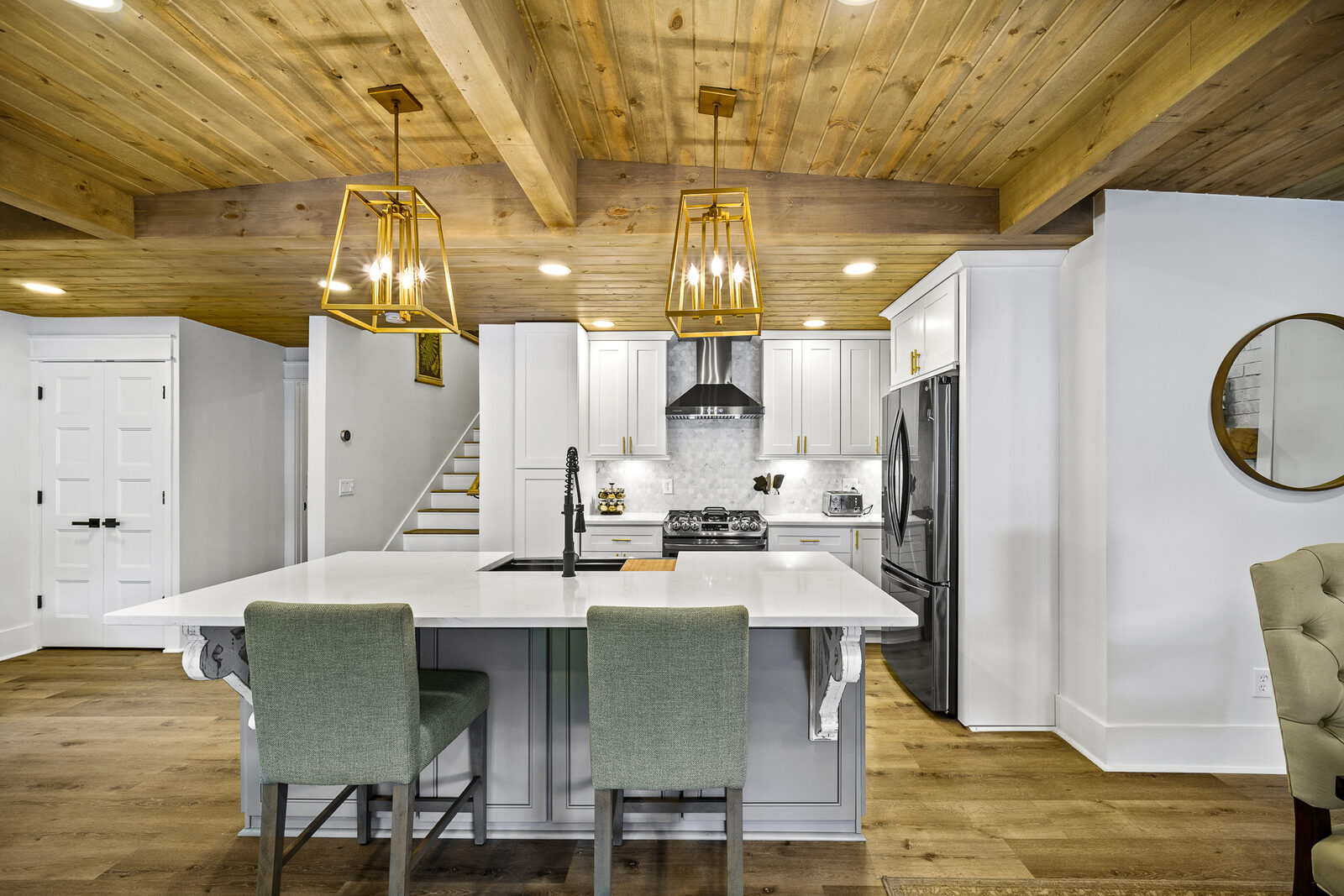 Lakehouse kitchen island with quartz waterfall counter