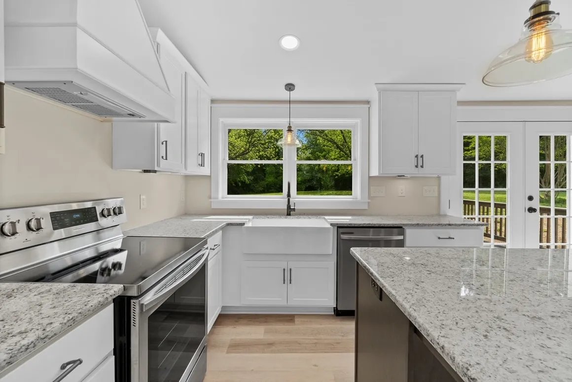 Restored kitchen with stainless appliances